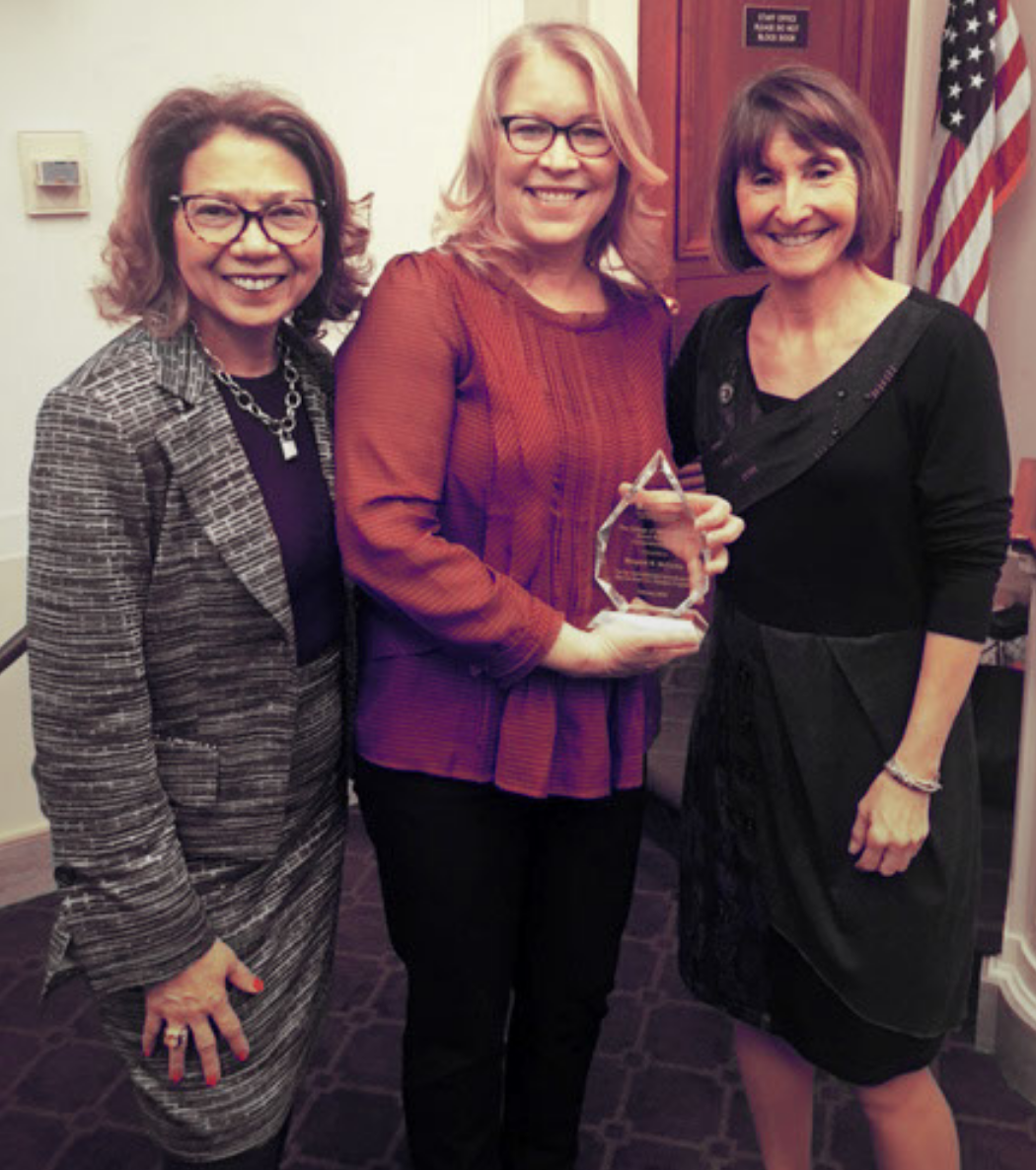 President Mildred García, Dean Sheryl Fontaine, and Cornerstone Recipient Margaret McCarthy