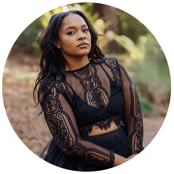 Portrait of Adelia Jones (Smiling African American black woman wearing a black dress).