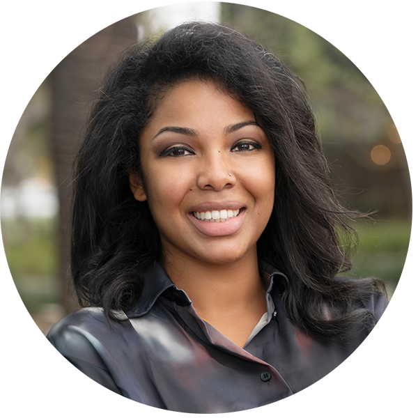 woman with black hair smiling