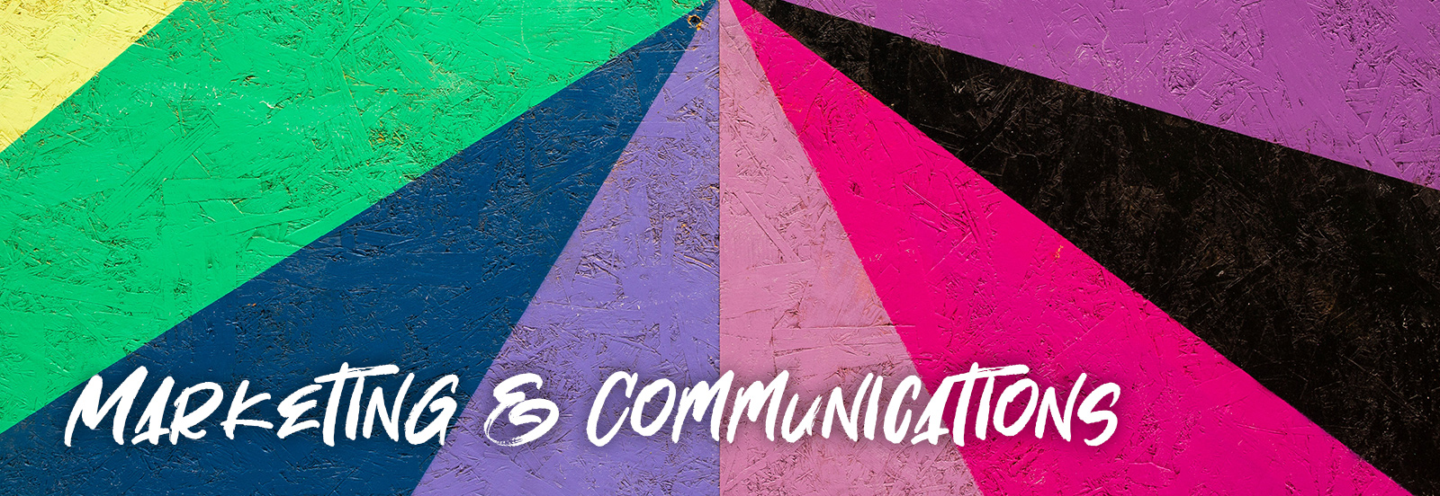 Marketing and Communications written on a multicolored background