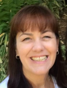 lady with brown hair smiling