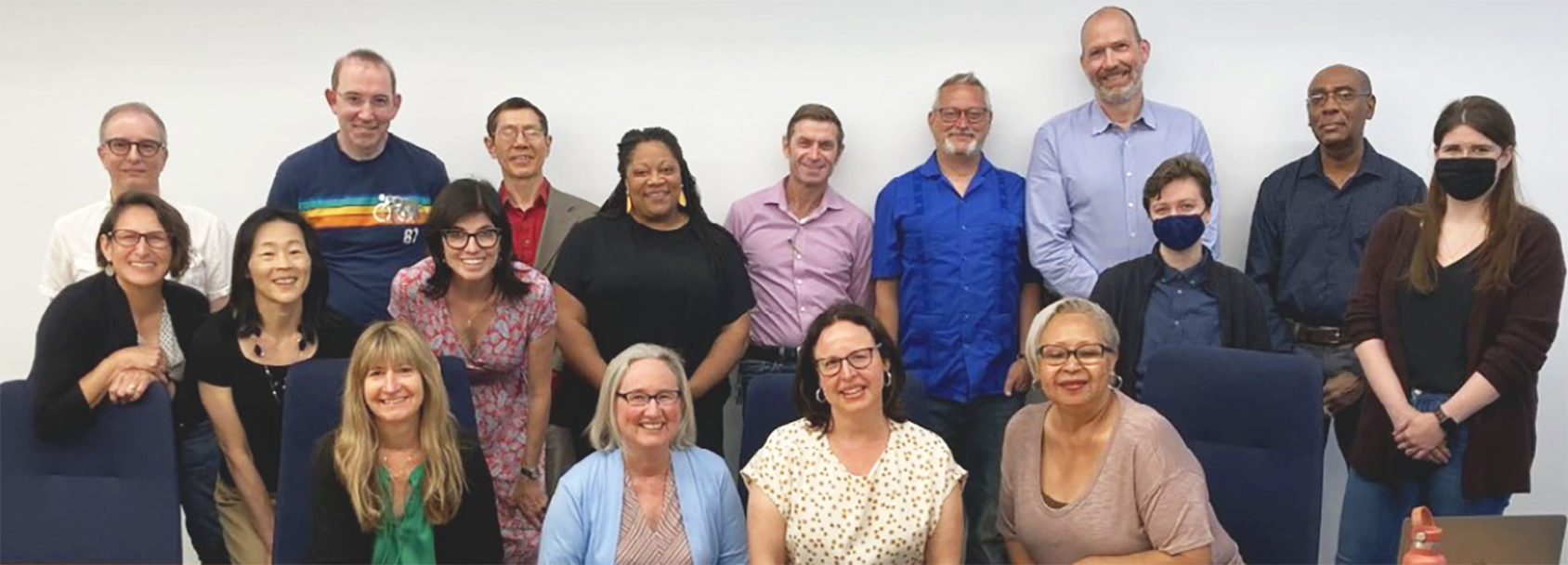 Faculty and Staff group picture. Everyone is smiling.