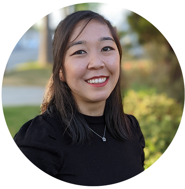 Portrait of Michelle Okawa (Smiling asian woman with black hair).