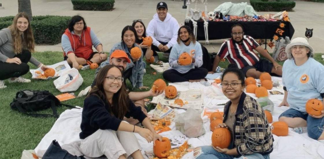 Sociology club carving pumpkins